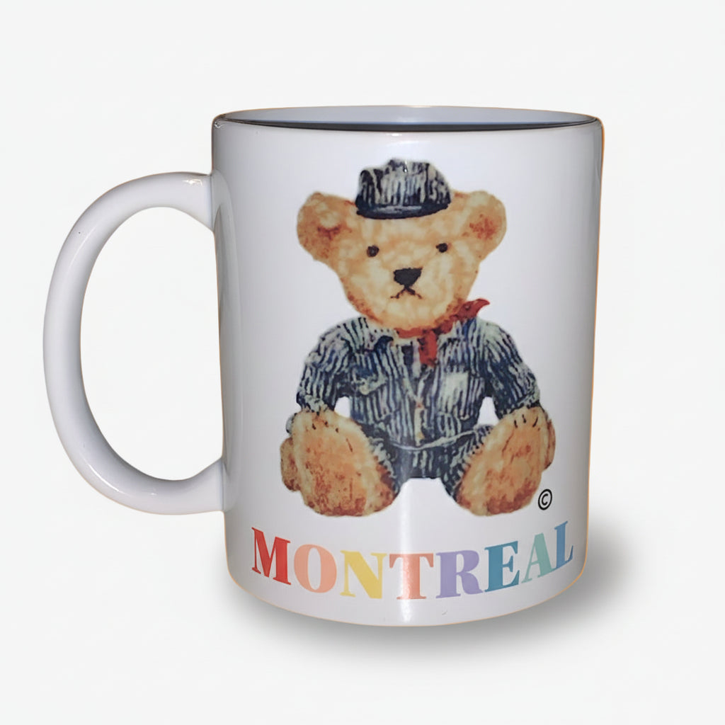 Mug with a teddy bear design and 'Montreal' text on a white background