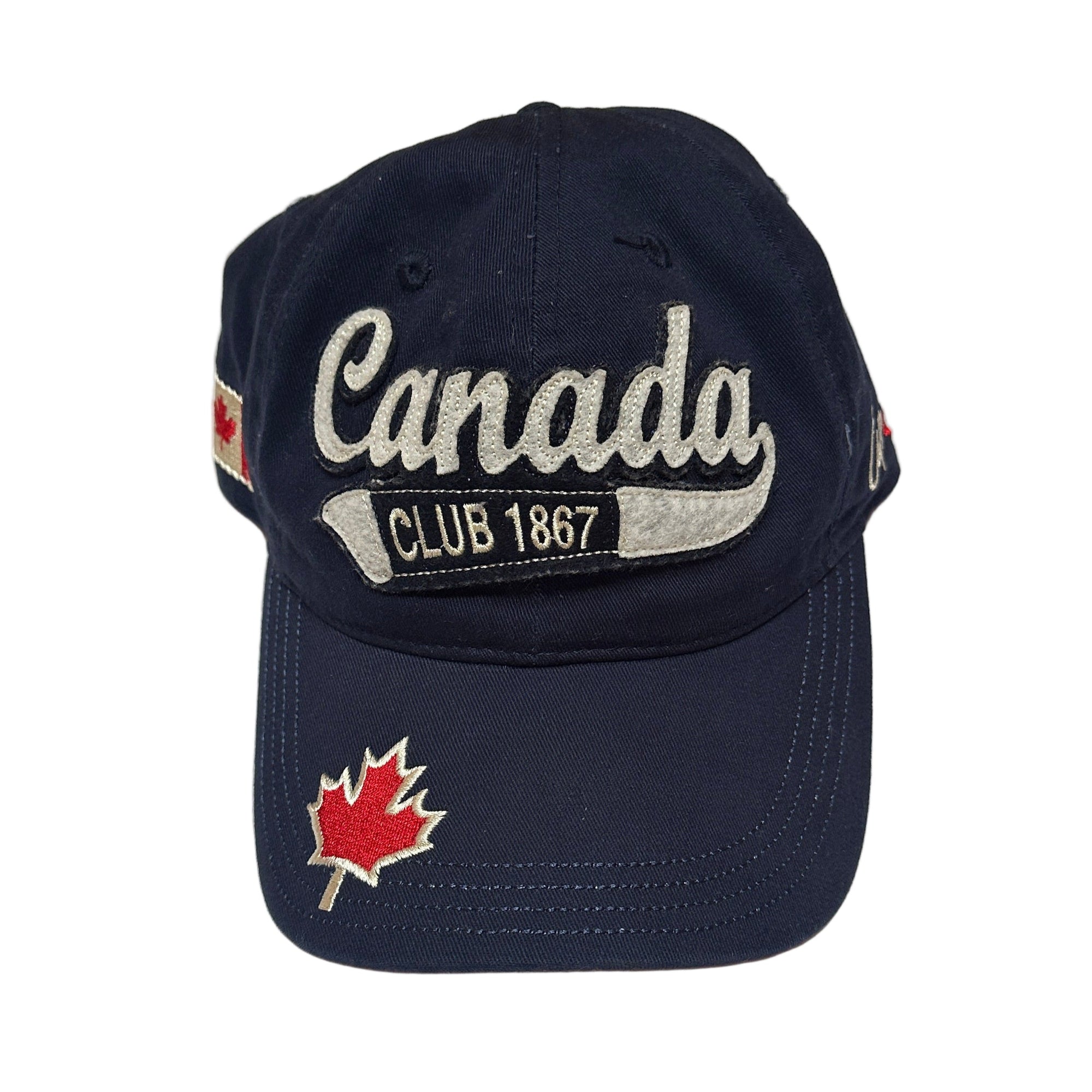 Navy blue cap with 'Canada Club 1867' text and maple leaf design on a white background