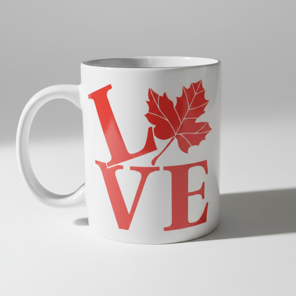 White mug with red 'LOVE' design featuring a maple leaf on a white background